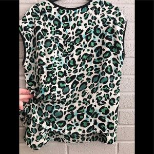 CAbi sleeveless size XS blouse.